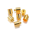 Assortment of small, bell-shaped copper caps in gold, silver, bronze, and black finishes for jewellery making.