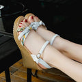 Pink women's wedge sandals with a fish mouth open toe and a thick non-slip sole.