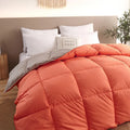 Goose down winter duvet in twill weave fabric, shown in one of six available colours.