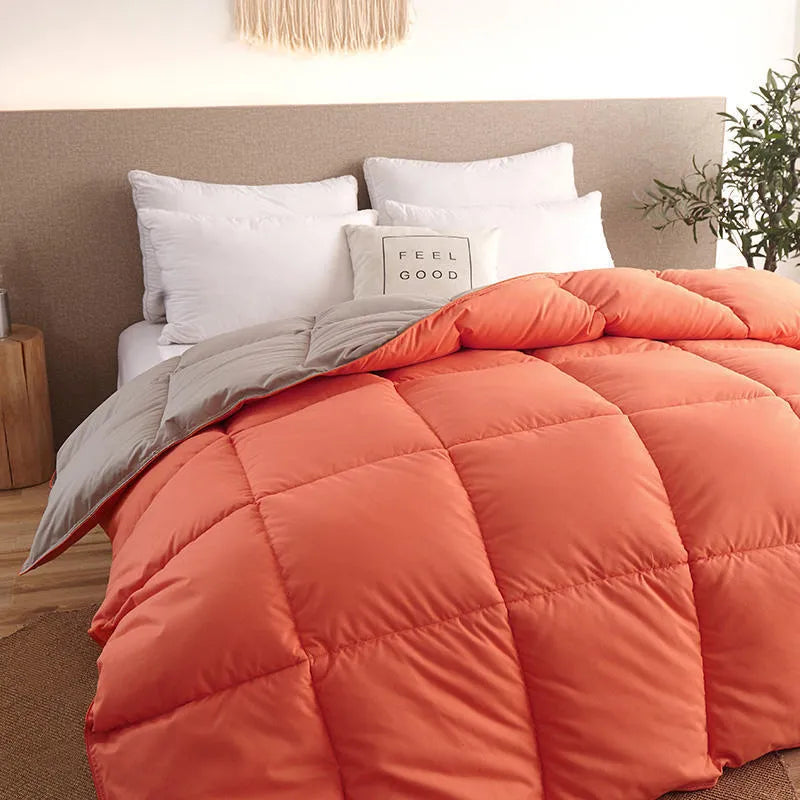 Goose down winter duvet in twill weave fabric, shown in one of six available colours.