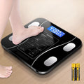 USB rechargeable body fat scale in black with LCD display and glass platform