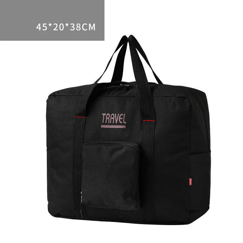 Foldable canvas travel bag in gray medium with soft handle and internal zipper pocket