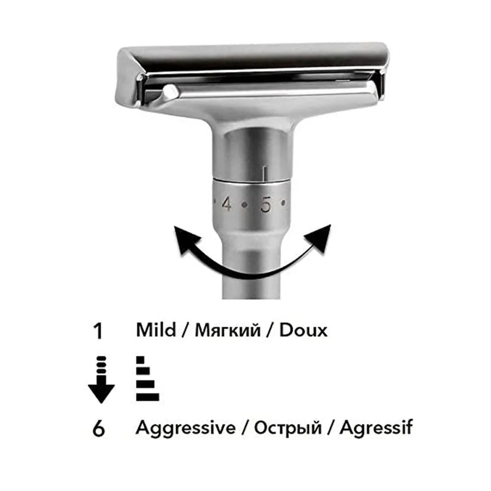 Old-fashioned men's manual razor with black zinc alloy handle and stainless steel blade on a neutral background