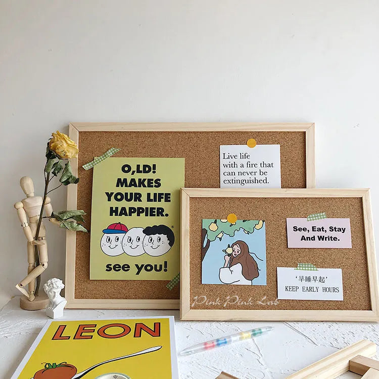 Cork notice board for wall or desk in two size options, shown with wooden stand.