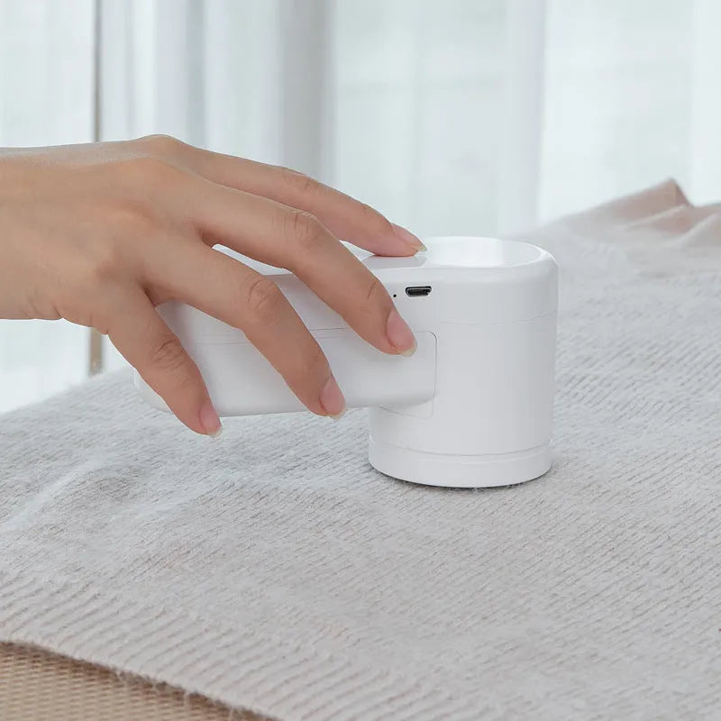 Portable white rechargeable electric lint remover trimmer with stainless steel blade