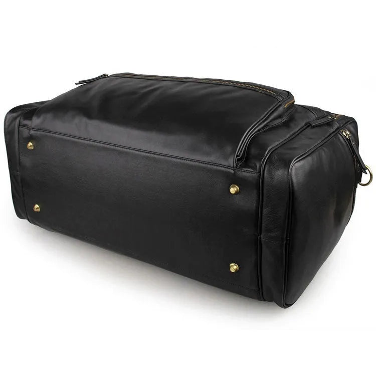Large black leather travel bag in first layer cowhide with shoulder strap and zipper closure for men