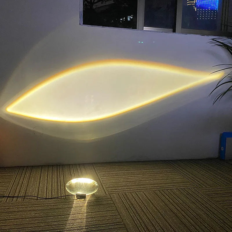 Projection lamp with crystal shade emitting warm LED light on a desk, 160x90 mm