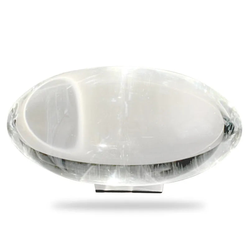 Projection lamp with crystal shade emitting warm LED light on a desk, 160x90 mm