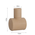 Morandi style ceramic vase with hammered texture in beige, brown, or purple.