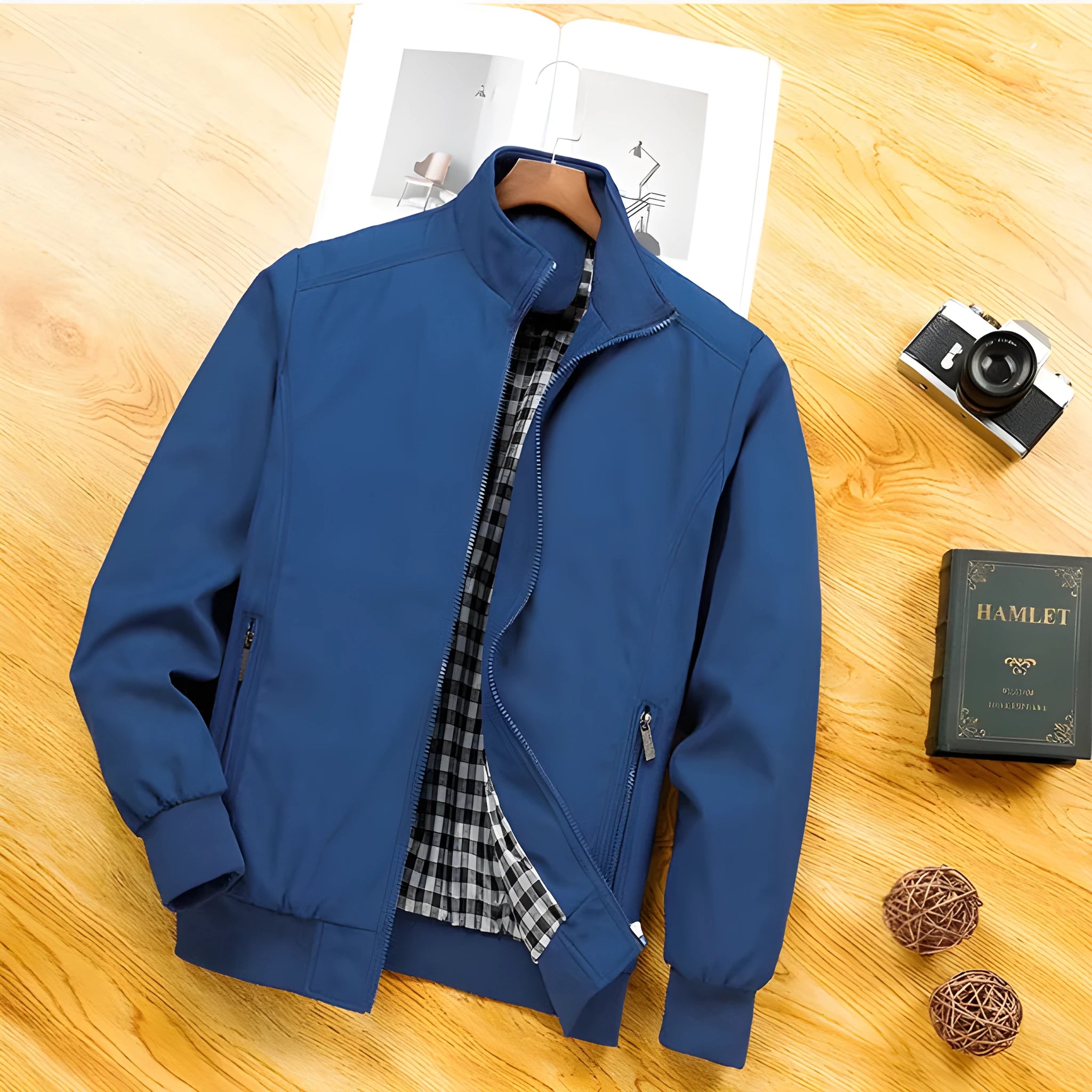Men's blue extra wide polyester casual jacket with stand collar and zip front on display.