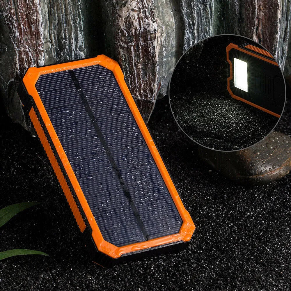 Orange Three Proofs solar power bank with 20000mAh capacity and multiple USB ports.