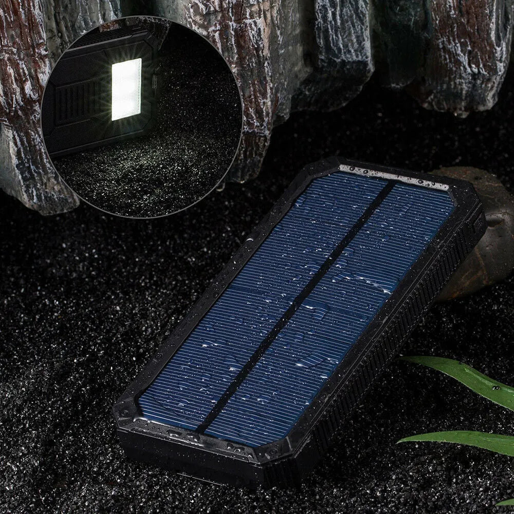 Orange Three Proofs solar power bank with 20000mAh capacity and multiple USB ports.