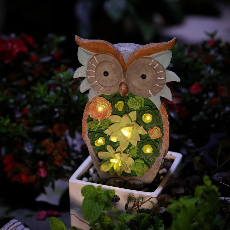 Solar animal light in owl, snail or tortoise style with rubber body and LED for courtyard or window sill
