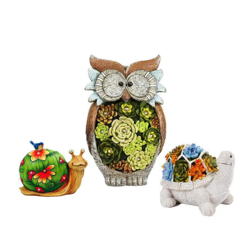 Solar animal light in owl, snail or tortoise style with rubber body and LED for courtyard or window sill