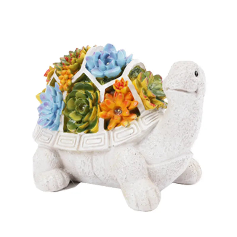 Solar animal light in owl, snail or tortoise style with rubber body and LED for courtyard or window sill