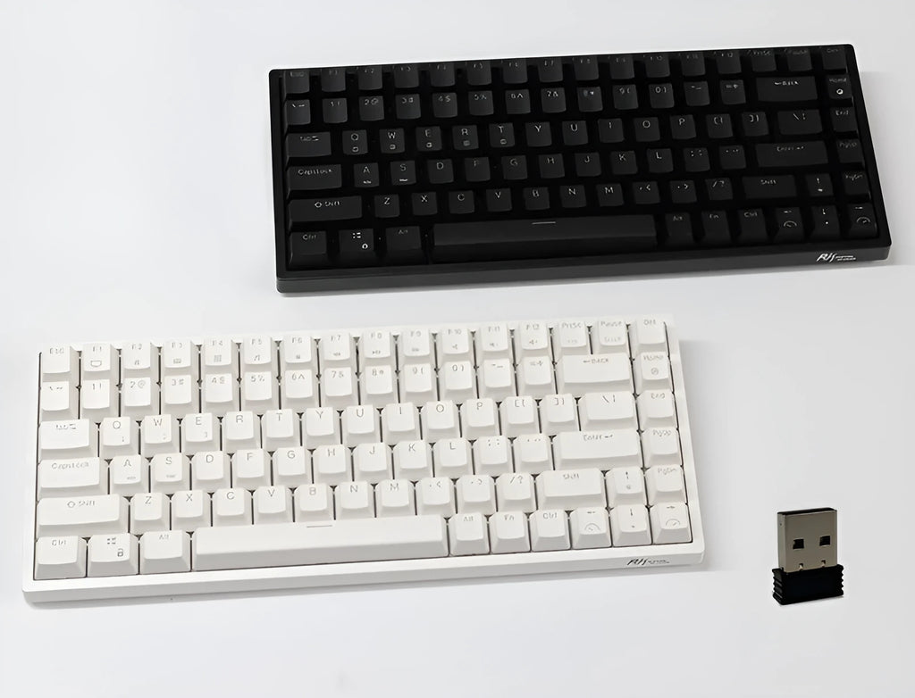 White 84-key mechanical keyboard with hot-swappable red switches and a detachable USB-C cable.