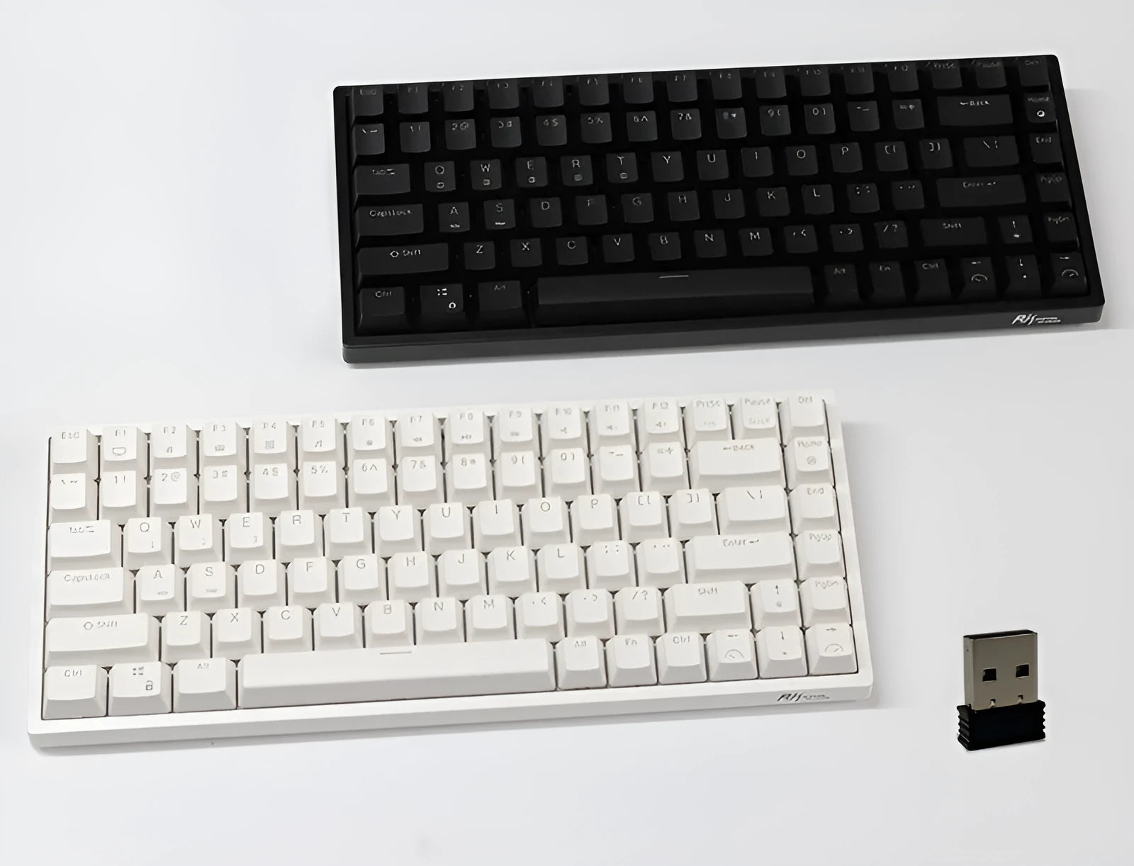 White 84-key mechanical keyboard with hot-swappable red switches and a detachable USB-C cable.