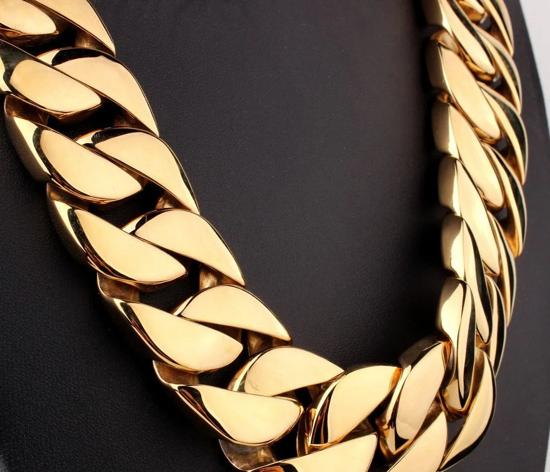 Men's gold titanium steel vacuum plating casting necklace with geometric design and whip chain on a white background