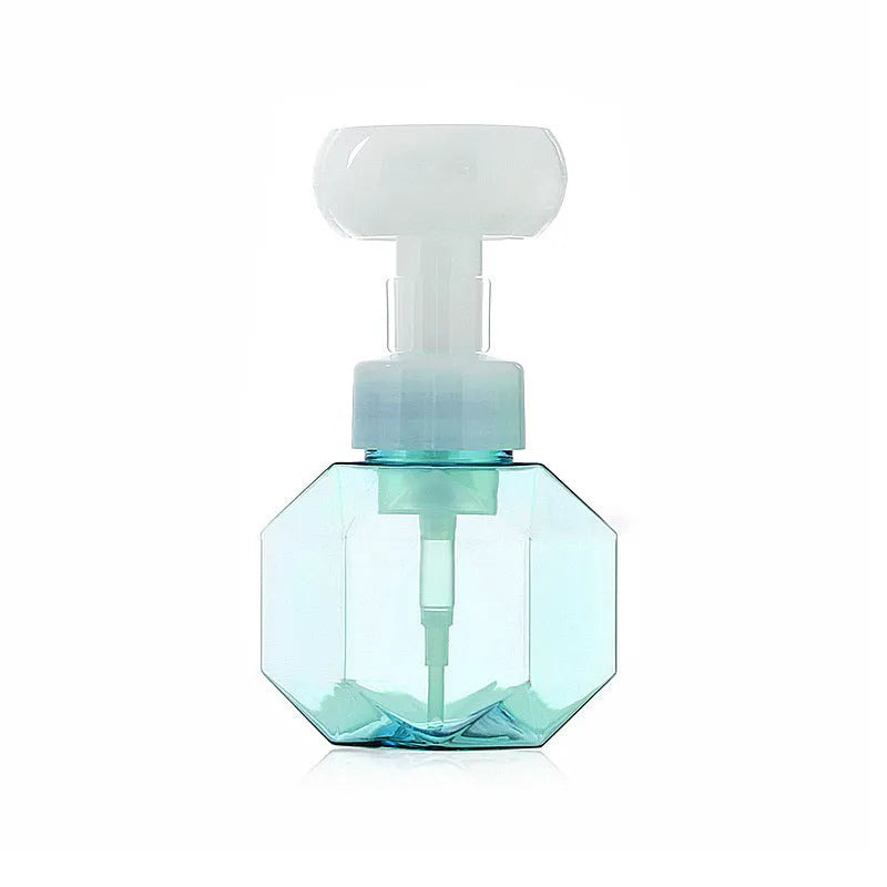 Refillable flower foam bottle for liquid soap in pink, green, blue, and yellow colour options.