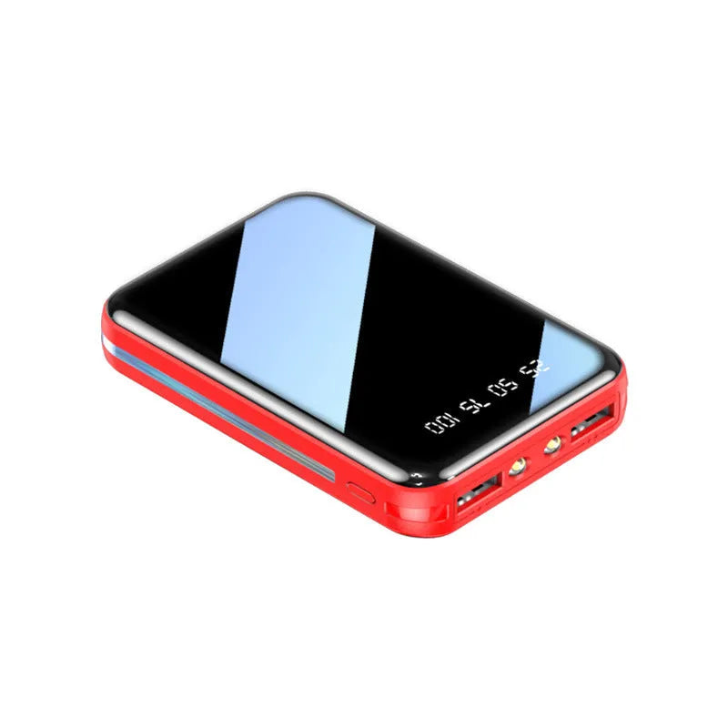 Compact power bank with digital display showing battery percentage and dual USB ports for device charging