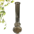 Pure colour glass American style tabletop vase decoration on a wooden surface.