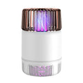 Electric mosquito killer lamp with USB power, purple light, and fan in black colour on a wooden table