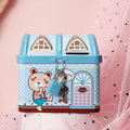 Blue house-shaped tinplate piggy bank for coin saving on desktop
