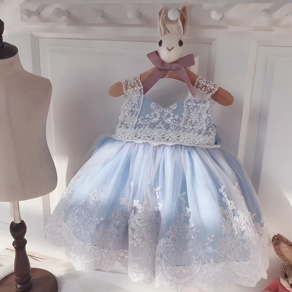 Ocean blue lace princess dress for baby girl on hanger showing lace detail
