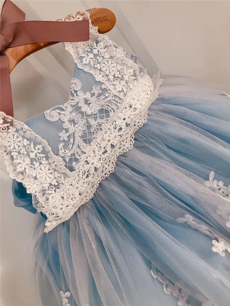 Ocean blue lace princess dress for baby girl on hanger showing lace detail