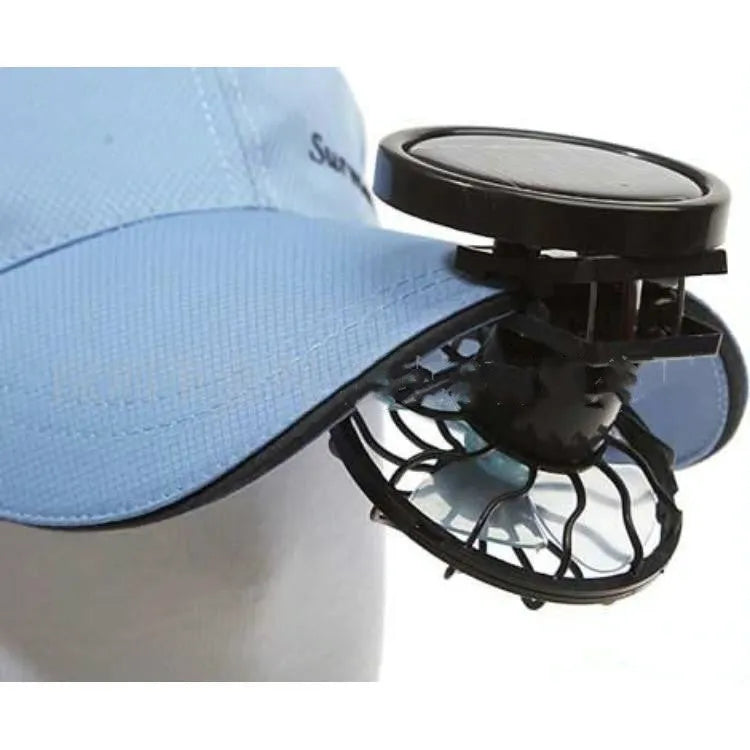 Black portable solar fan panel with clip, for outdoor cooling during camping and fishing.