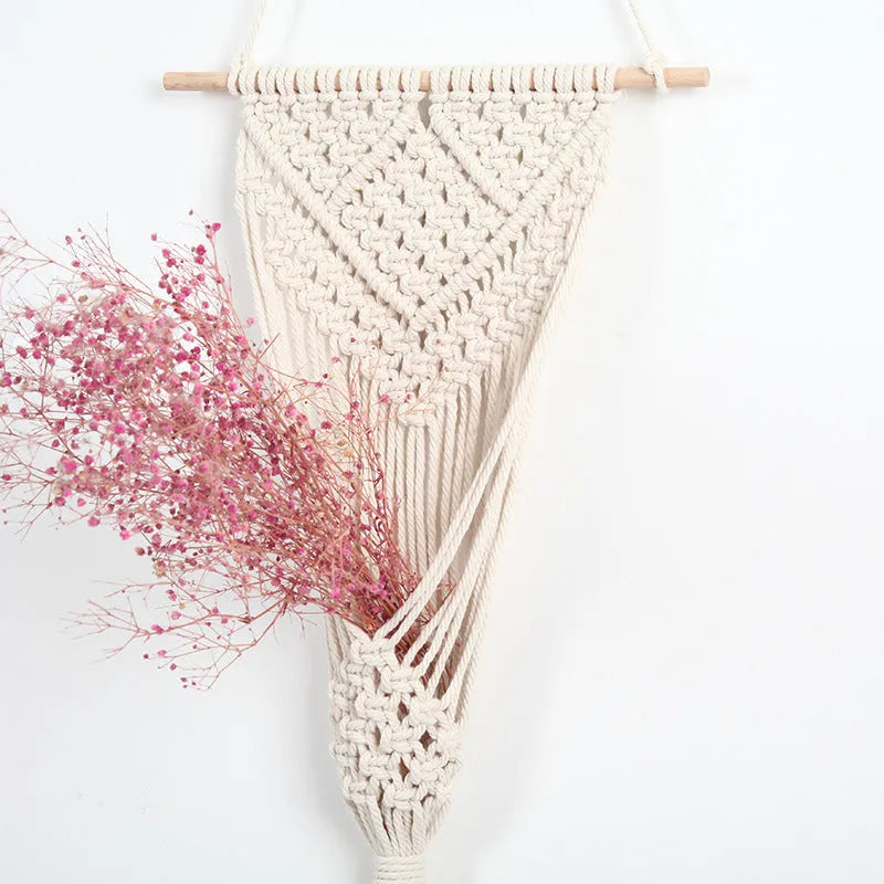 White cotton woven net bag wall decoration with rectangular grid pattern measuring 30cm by 70cm