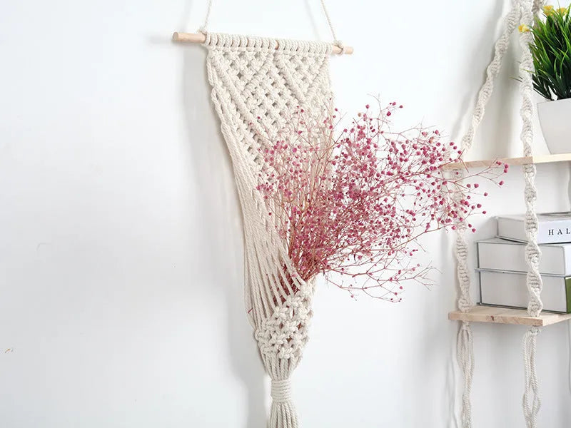 White cotton woven net bag wall decoration with rectangular grid pattern measuring 30cm by 70cm