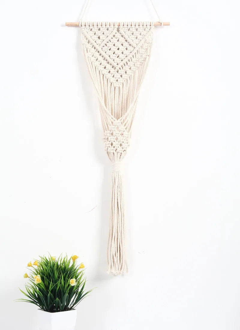 White cotton woven net bag wall decoration with rectangular grid pattern measuring 30cm by 70cm
