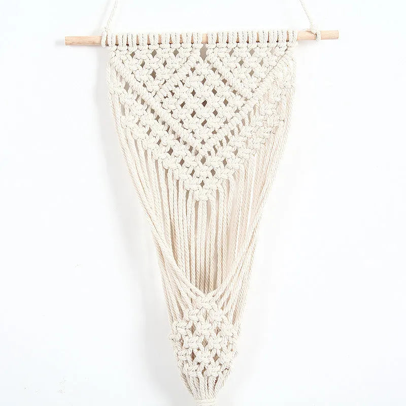 White cotton woven net bag wall decoration with rectangular grid pattern measuring 30cm by 70cm