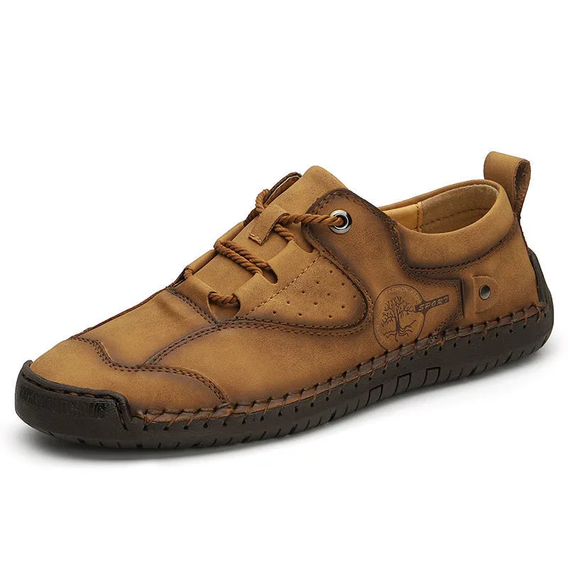 Men's black microfiber casual leather shoes with a round toe on a plain background.