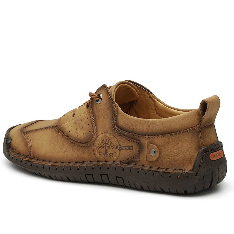 Men's black microfiber casual leather shoes with a round toe on a plain background.