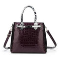 Horizontal square PU leather women's handbag with geometric stitching pattern and zipper closure in black