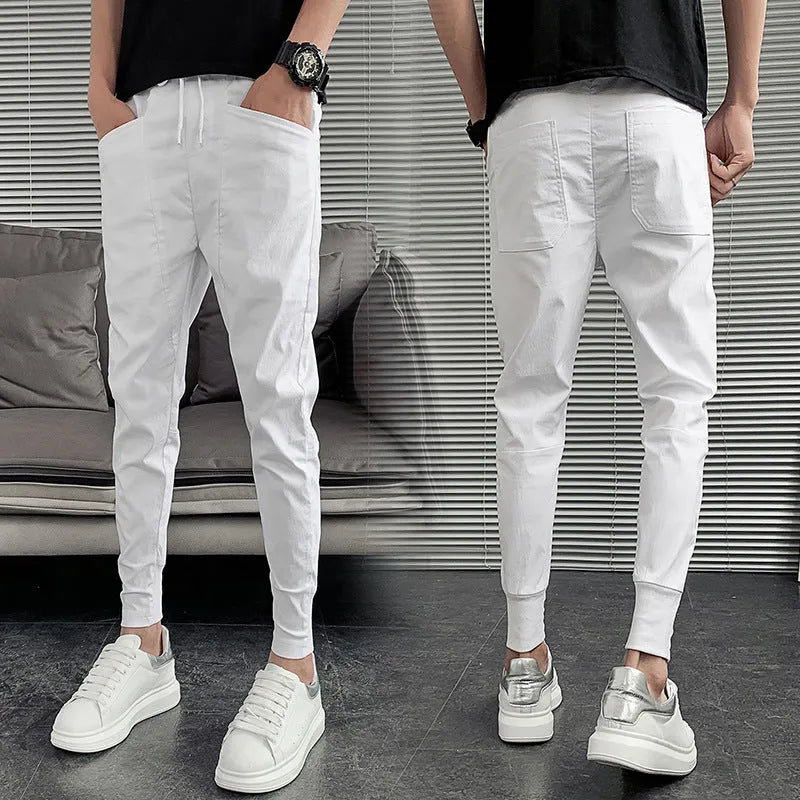 Slim trousers solid colour Harlan trousers mid waist tether closure polyester fabric black colour front view