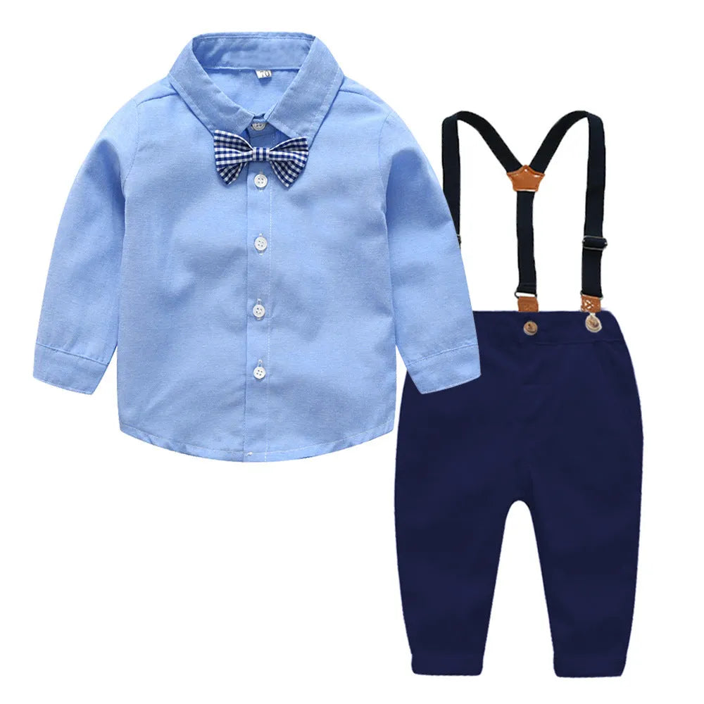 Boys blue Korean-style formal pants suit with long sleeves and a bow tie.