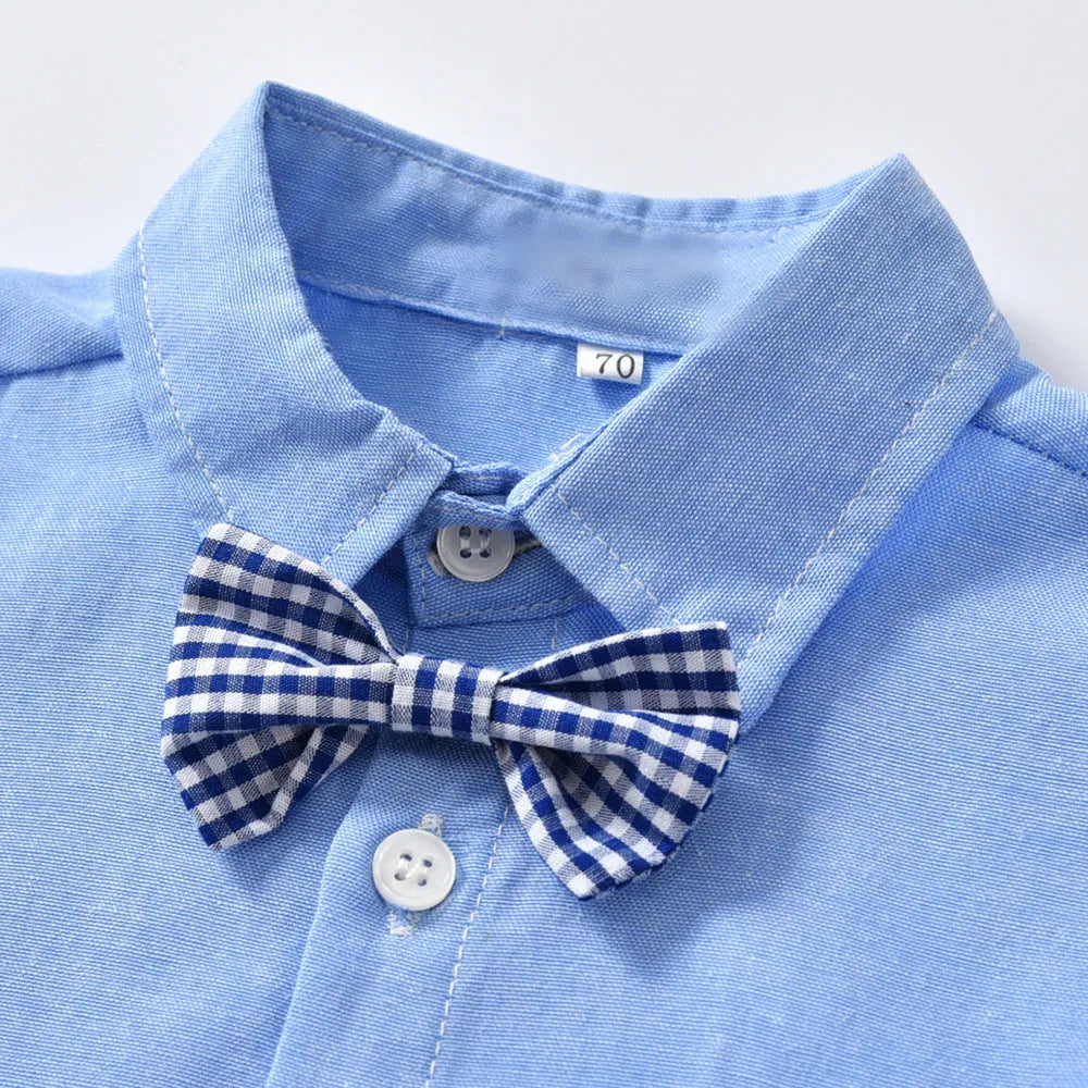 Boys blue Korean-style formal pants suit with long sleeves and a bow tie.