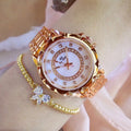 Women's quartz watch with 32mm round dial, alloy case, and mineral glass in a choice of gold or silver finishes