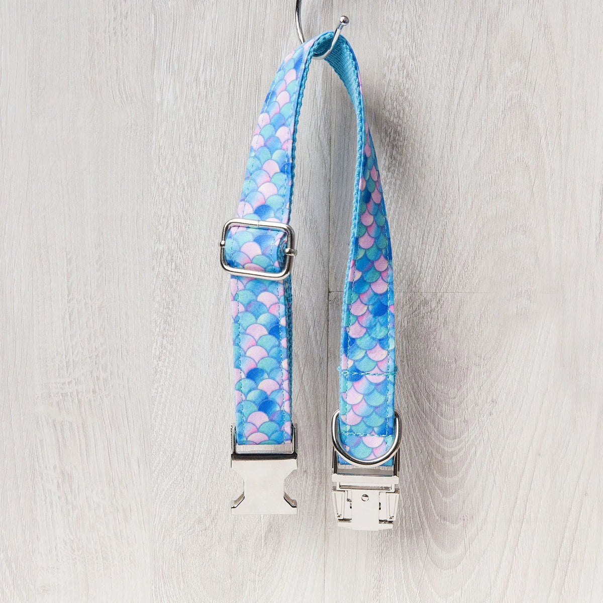 Blue polyester mermaid pet collar with plastic clip closure, shown on white background