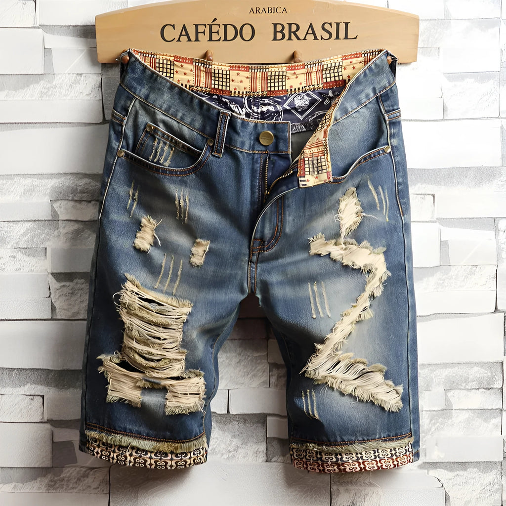 Men's big hole distressed denim Capri shorts in blue with straight leg and mid-rise waist