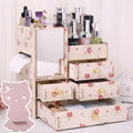 Wooden tabletop drawer cosmetic storage box for organising makeup and jewellery.