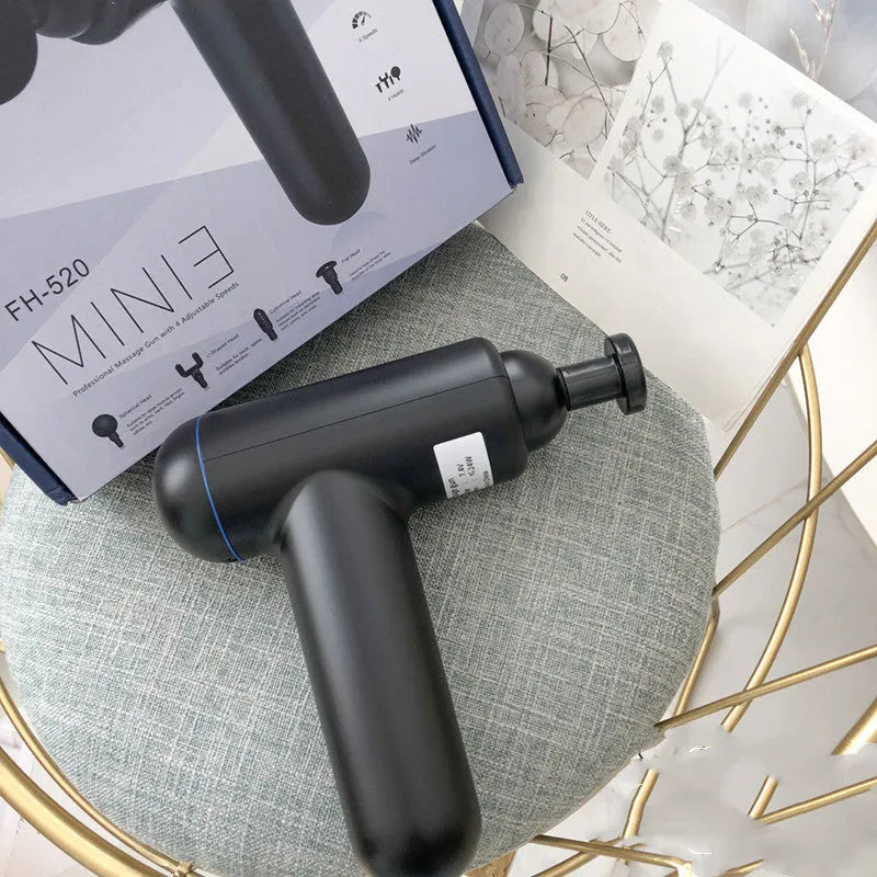 God Fascia Gun handheld percussion massager in black, red, or white colours with USB charging cable.