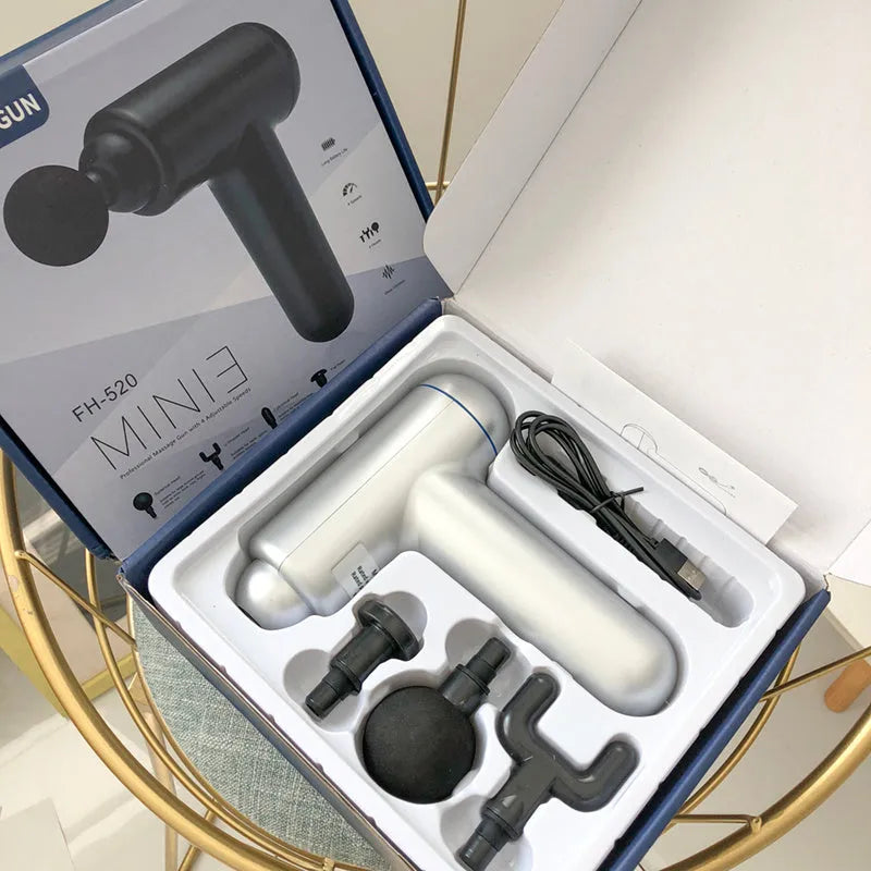 God Fascia Gun handheld percussion massager in black, red, or white colours with USB charging cable.