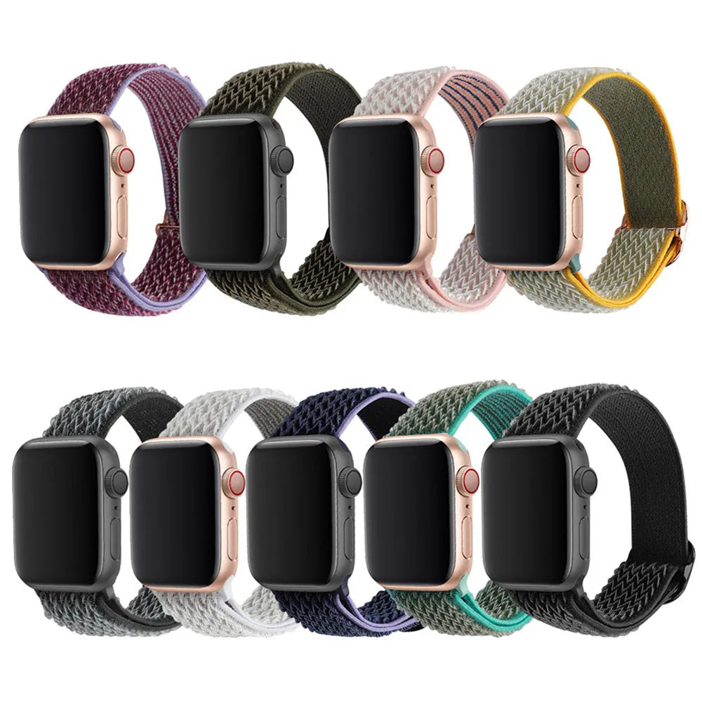 Braided elastic nylon Apple Watch strap in multiple colours on a grey background.