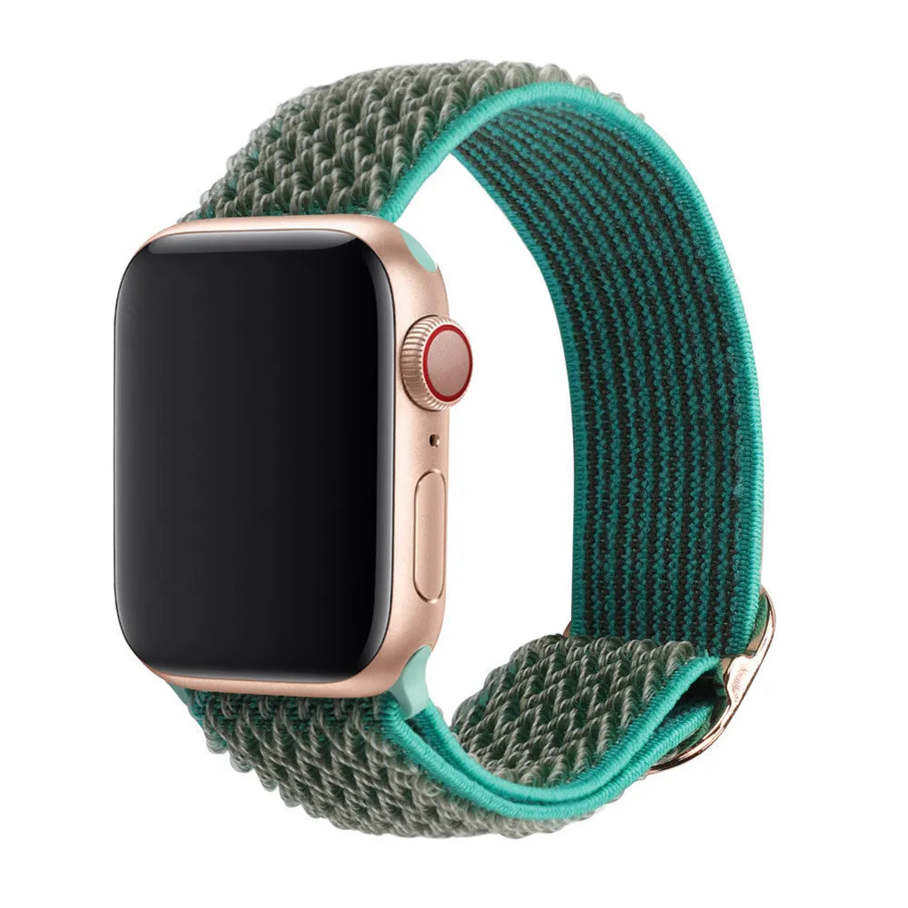 Braided elastic nylon Apple Watch strap in multiple colours on a grey background.