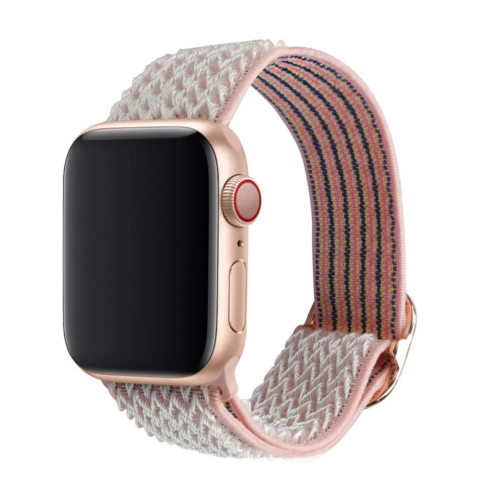Braided elastic nylon Apple Watch strap in multiple colours on a grey background.