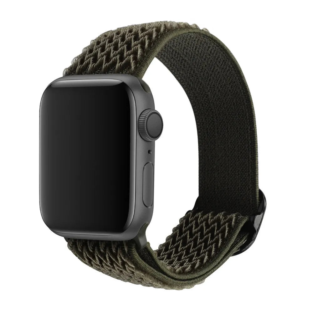 Braided elastic nylon Apple Watch strap in multiple colours on a grey background.